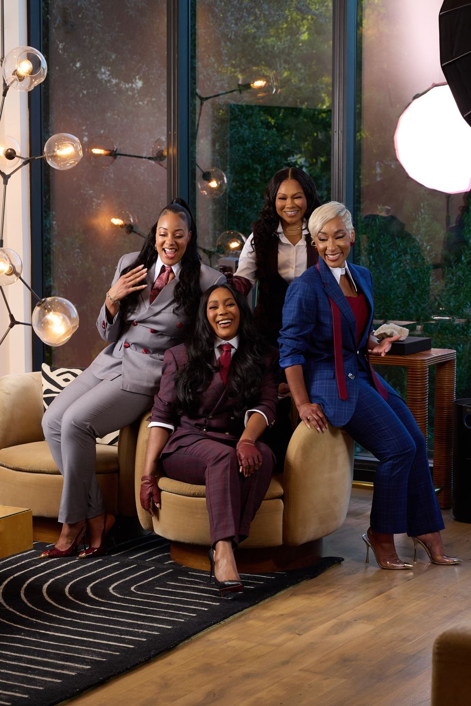 The four 2026 honorees laughing together.